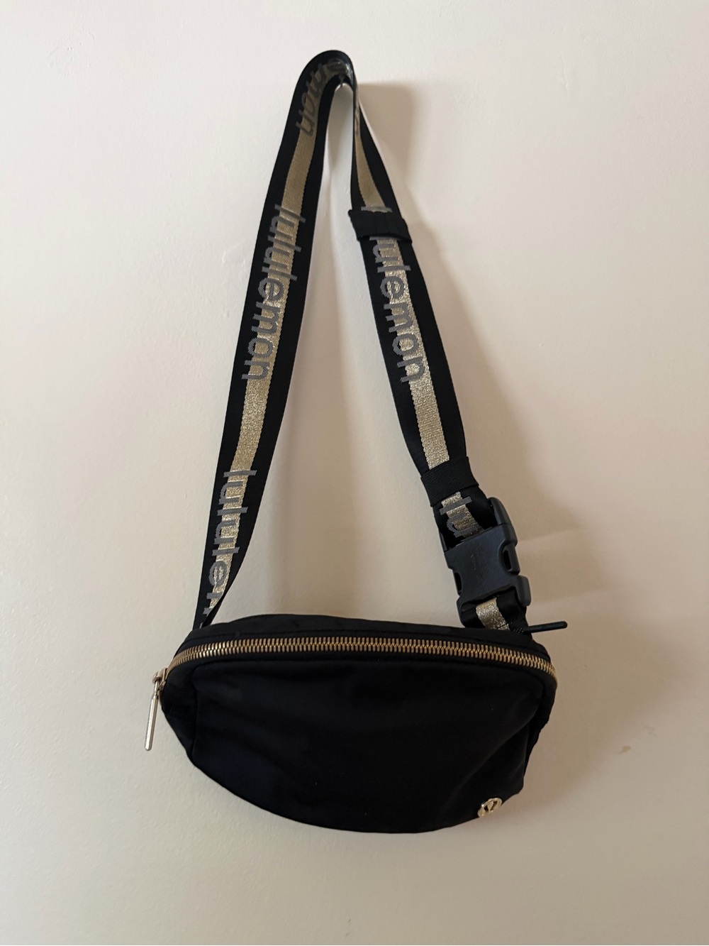 lululemon athletica Black Waist Pack with Gold Accent Strap
